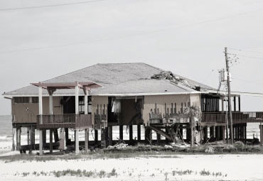 Wind damage - spray foam can help prevent uplift to Jackson roofs